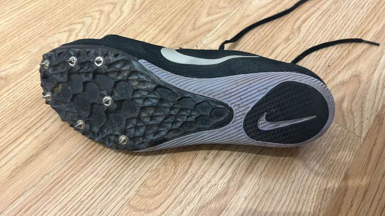 Athletics shoes with spikes 