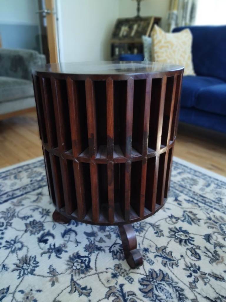 Rotating rose wood bookcase