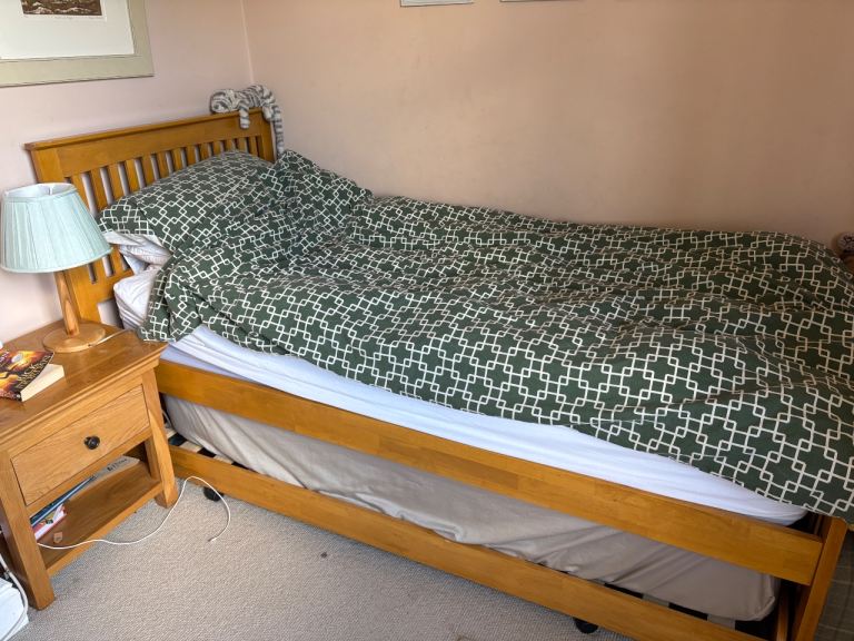 Single bed with pull out guest bed and 2 mattresses. 