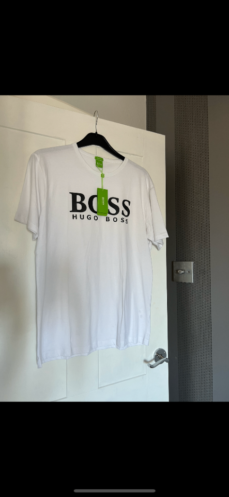 Men’s t shirt size medium to large with tags 