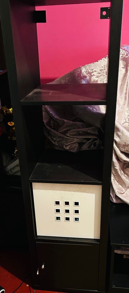 Ikea standing shelving unit with an insert