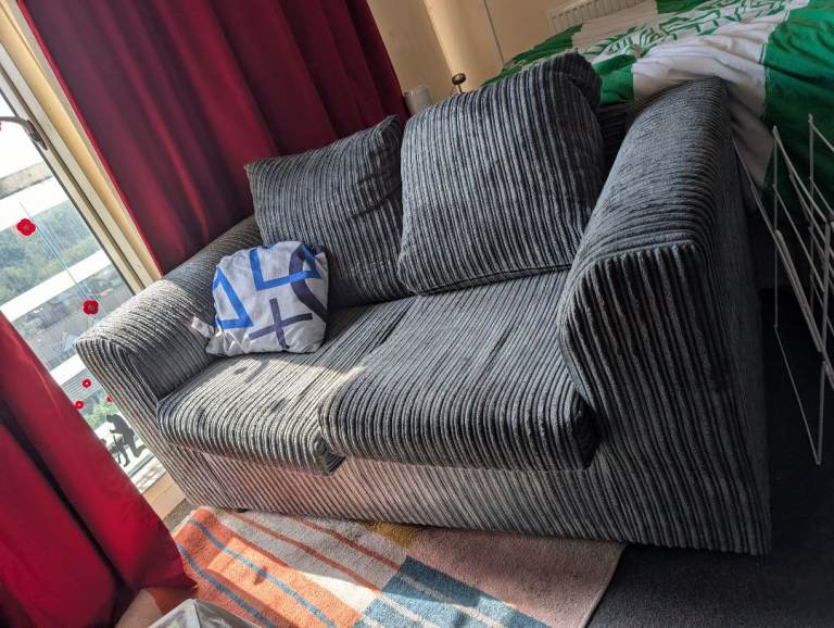 Grey Two-Seater Sofa – Good Condition