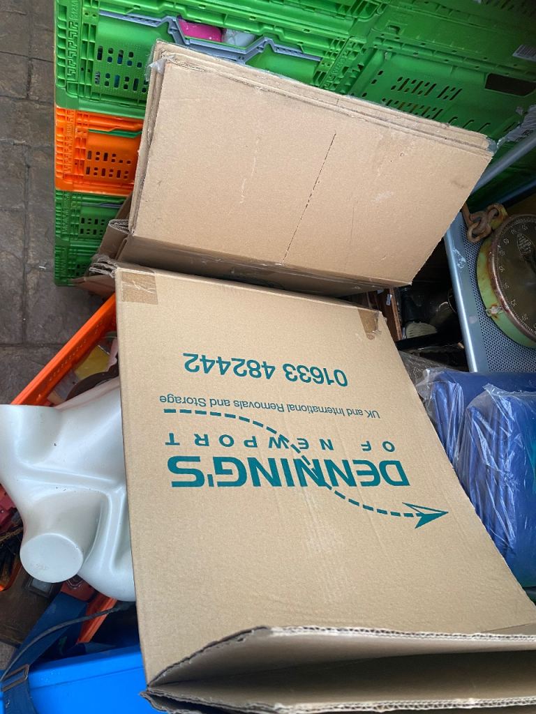 Fifteen large cardboard moving boxes 