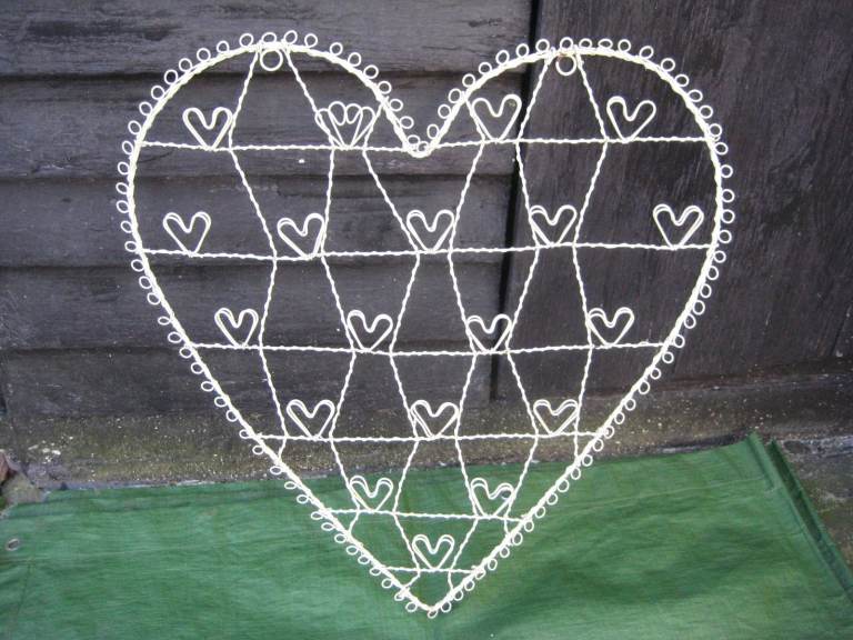 Ornamental The Art of Hearts - Two Hearts in One for £5.00