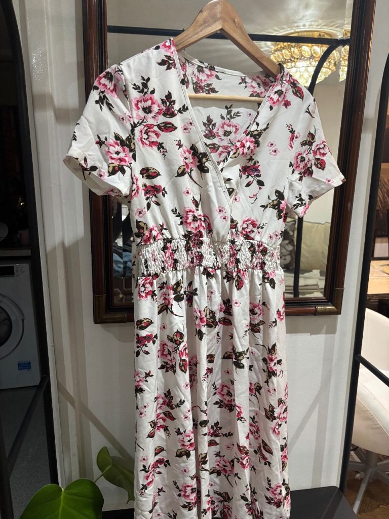 floral print shirred waist dress with a V-neck and short sleeves. 
