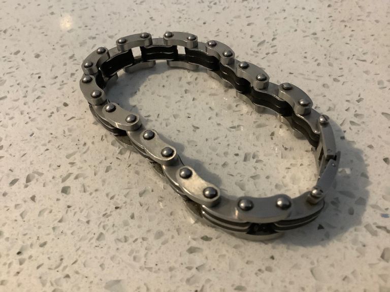 STAINLESS STEEL & BLACK,.. IMITATION UNISEX MOTORCYCLE CHAIN BRACELET,.. VGUC PRICED TO SELL AT 