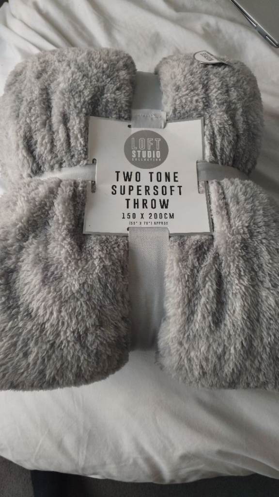 Fleece throw, brand new. NOW ONLY £7.50 light grey colour