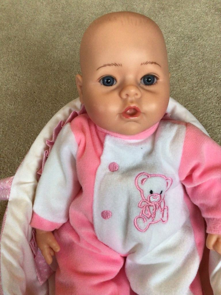 Baby doll with carrycot
