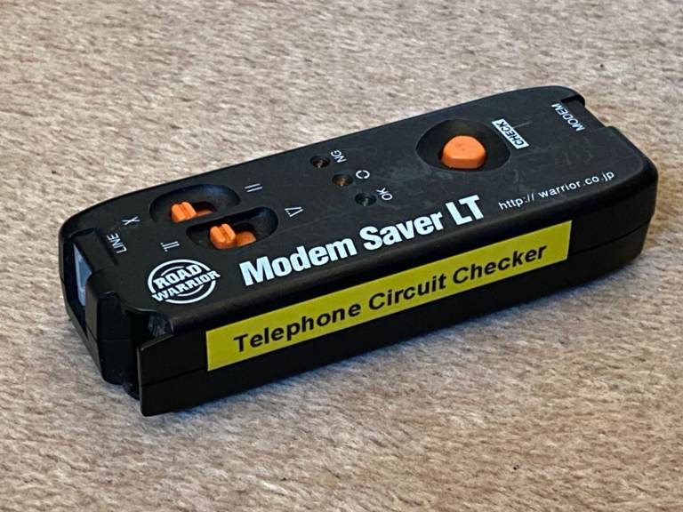Road Warrior Modem Saver LT, a telephone circuit checker and surge protector. 