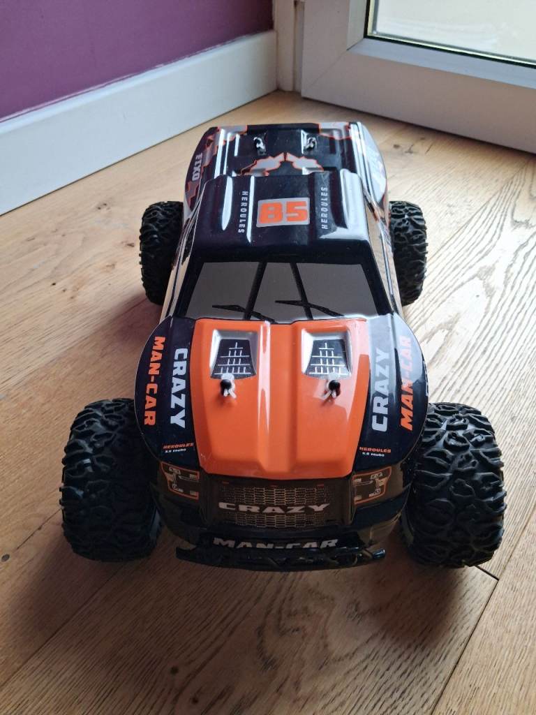 RC Monster Truck – Black and Orange, Good Condition
