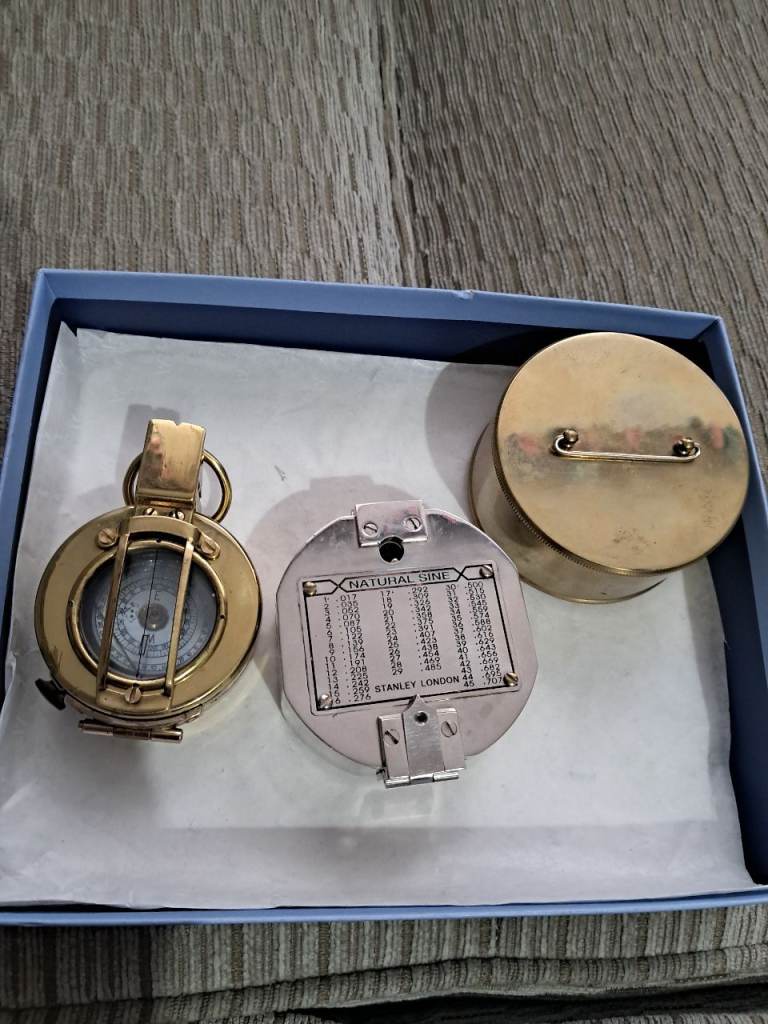 3 solid brass items 2 compas  milltary stamped 1943 and1 Stanley of London and Pocket Saxtant 