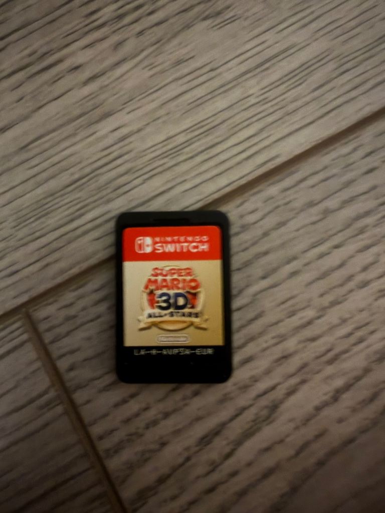 Nintendo Switch multiple games, including Mario 3D Allstars , Zelda, Super Smash Brothers