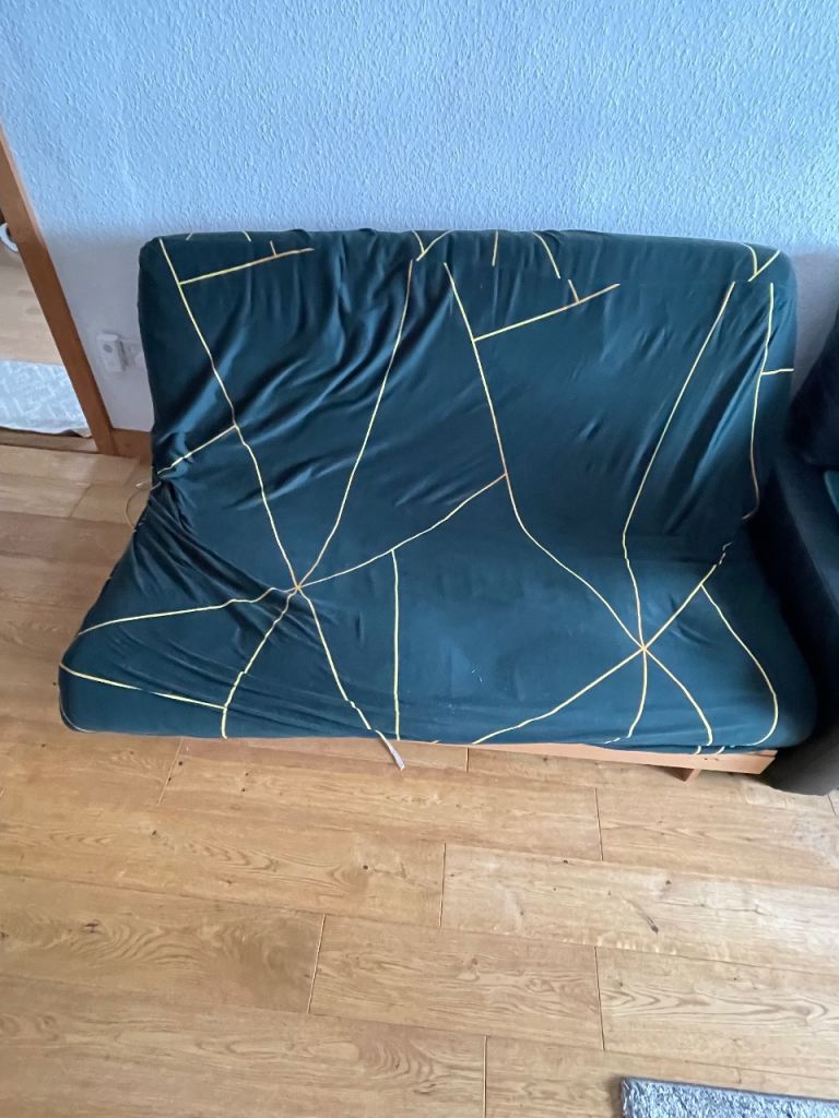 Futon Sofa Bed with Geometric Pattern – Good Condition
