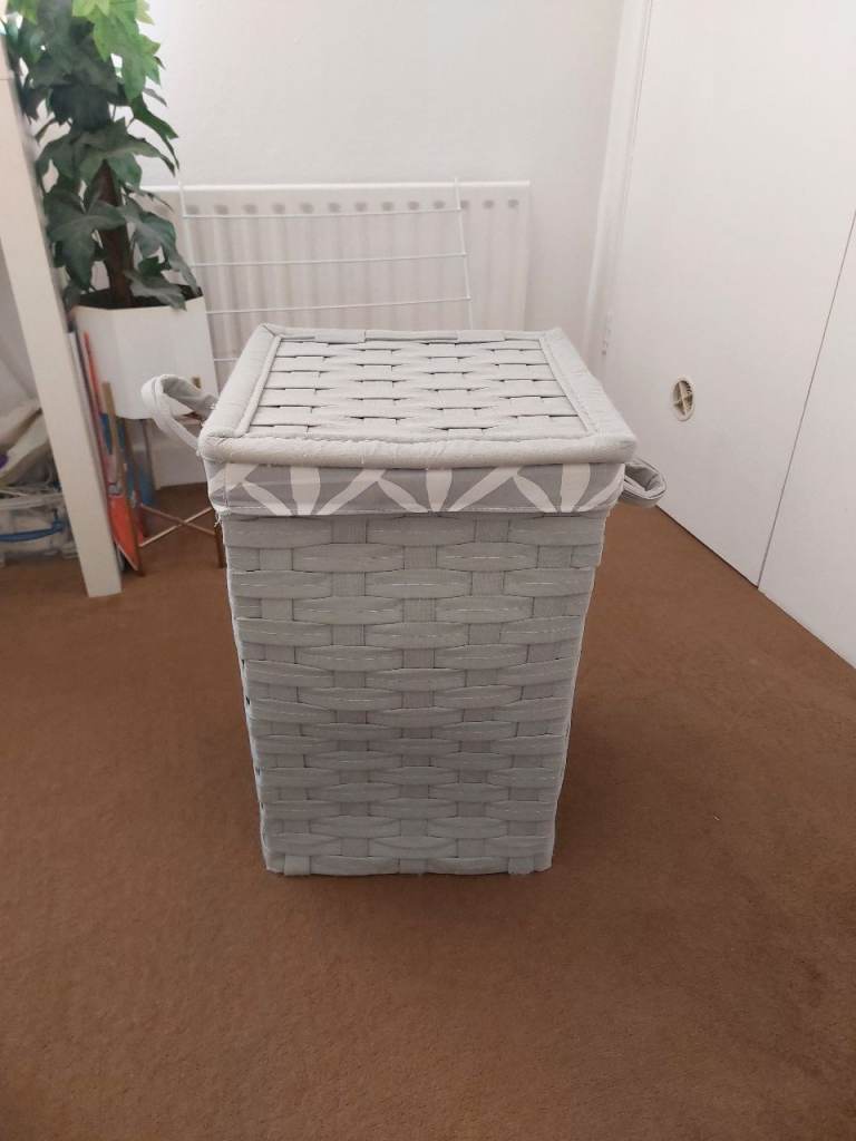 Grey fabric laundry basket