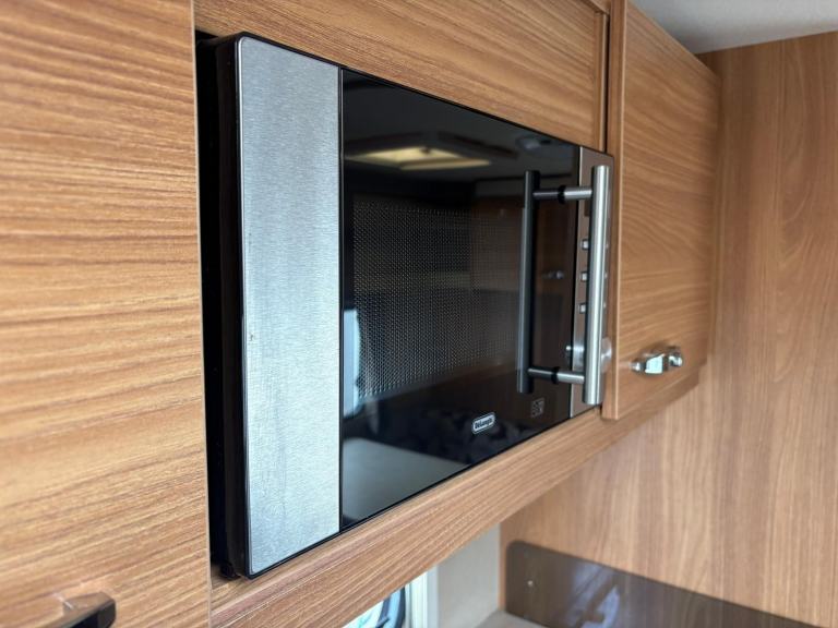 SPRITE MAJOR 4  - 4 BERTH CARAVAN, SIDE LOUNGE AREA ,END WASHROOM & MOTORMOVER