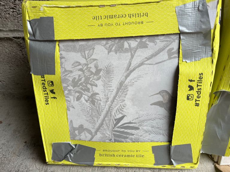 2 boxes of Ted Baker tiles