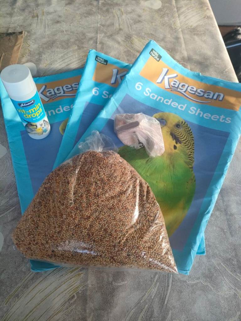 Budgie food/ sand sheets FREE