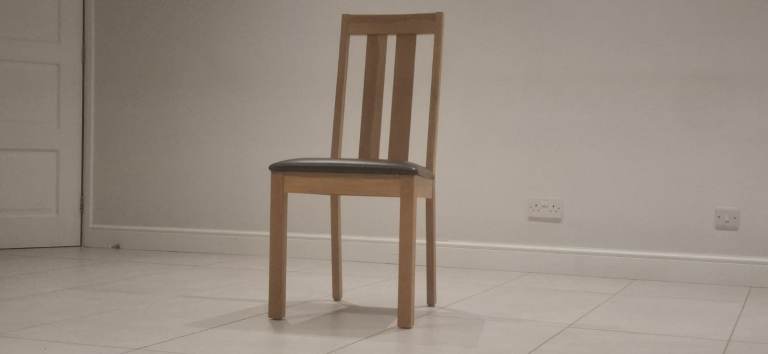 Wooden dining chairs with faux leather seat