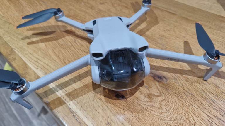 Dji mini 3 drone with battery, controller, wires , case