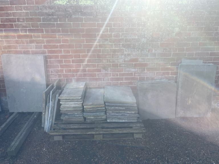 Sandstone paving slabs, unused.
