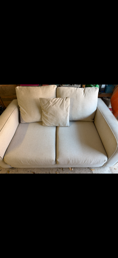 Cosy Beige Fabric Two-Seater Sofa – Good Condition