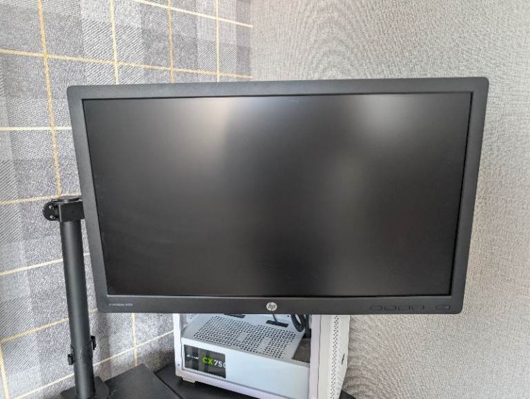 HP Elitedisplay Monitor (E232) with monitor side arm for desk mounting