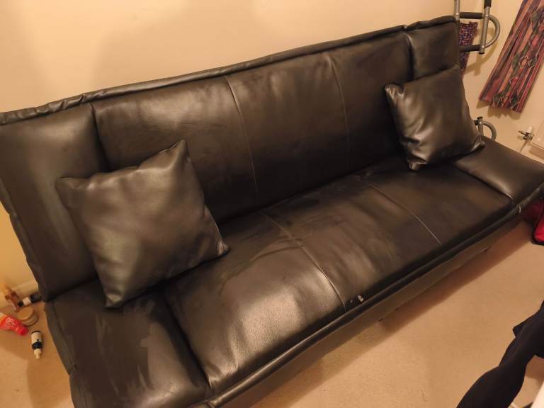 Black Sofa with cushions 