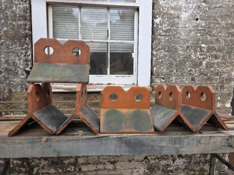 Reclaimed two hole crested terracotta ridge tiles 90 degree x 6 off.