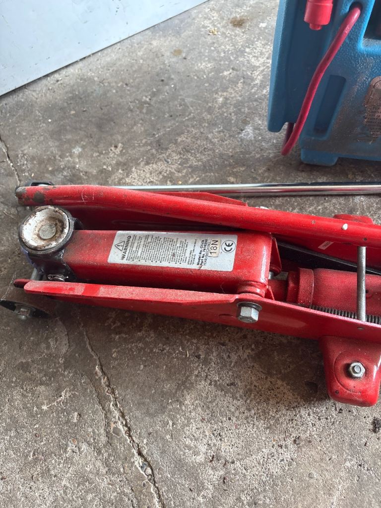 Jack, breaker bar, jump start and charger 