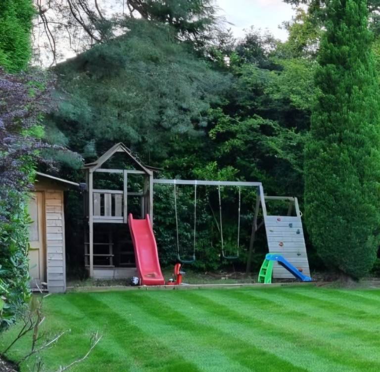 Kids Climbing frame with house, slide and swings 