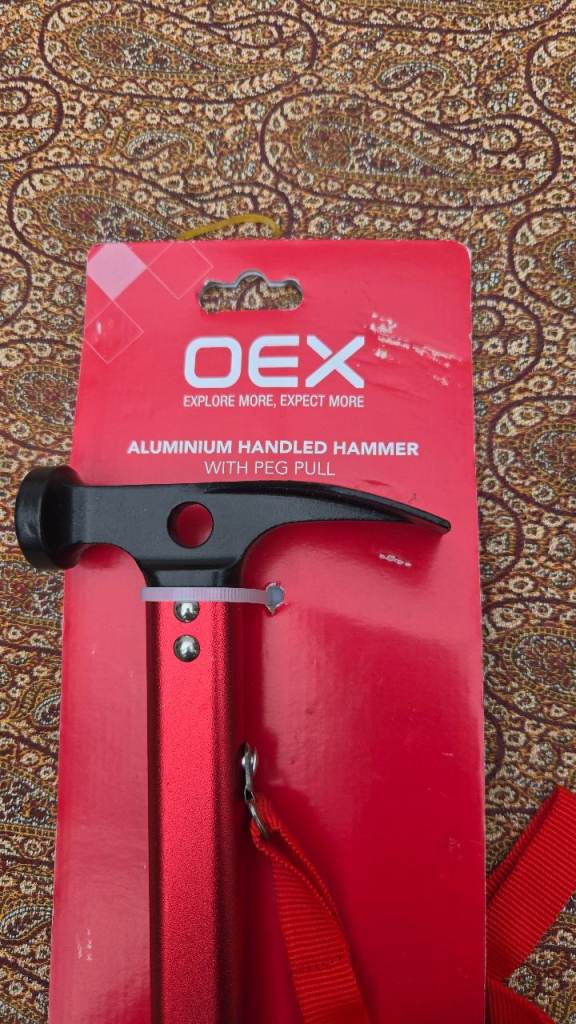Hammer with peg pull
