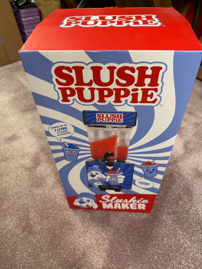 Slush puppy machine with syrup boxed
