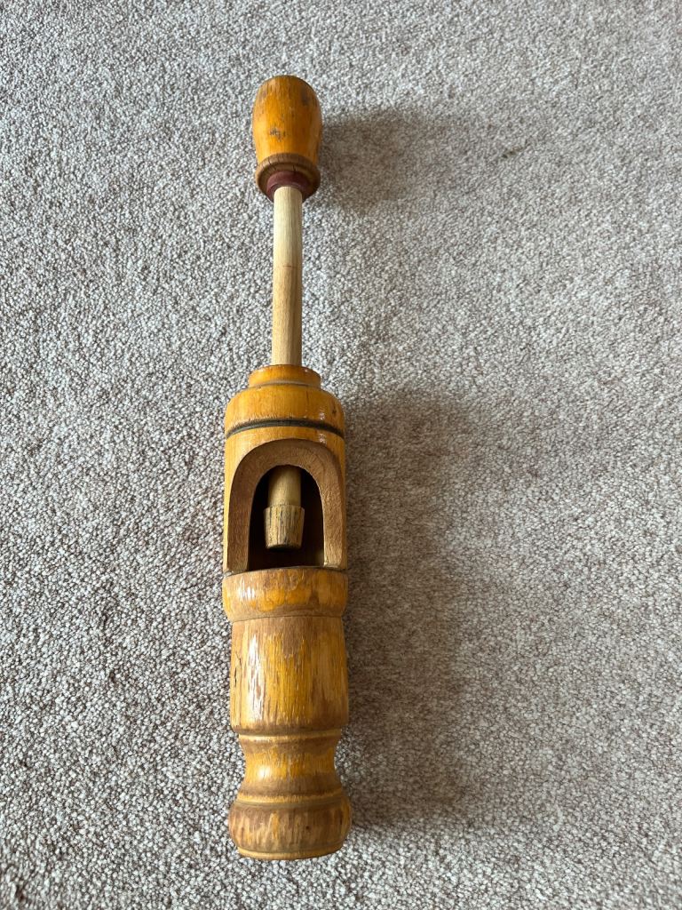 Wooden vintage wine corker