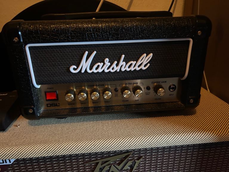 Marshall ds1 head and Peavey 112-c celestian vintage 30  60 watt cab . With channel foot switch 