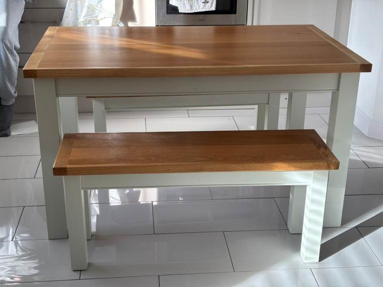 Dunhelm dining table and two benches 