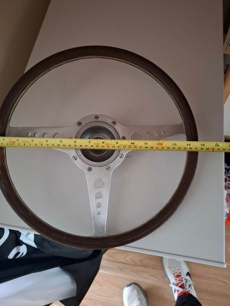 Classic wooden rimmed steering wheel 