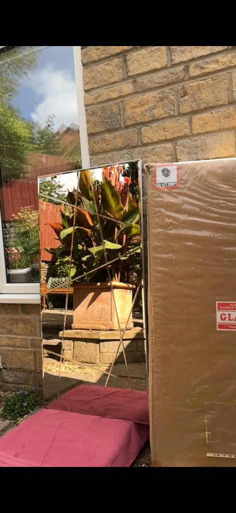 Large mirror. New in box 