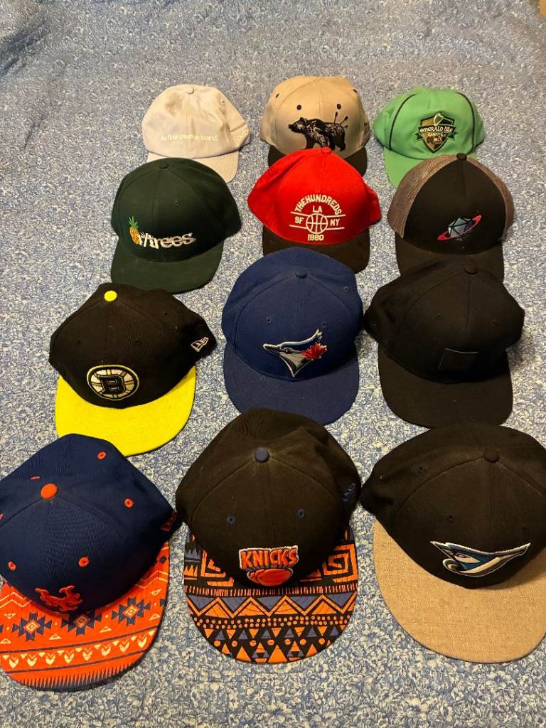 12 baseball caps