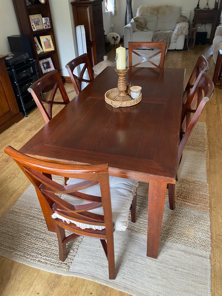 FREE Solid wood dining table and six chairs
