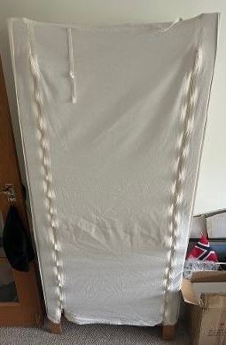 FREE Cream fabric-covered pine-framed wardrobe COLLECTION ONLY