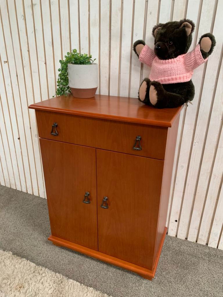 Cupboard with 1 Drawer and 2 Doors Brown wood .