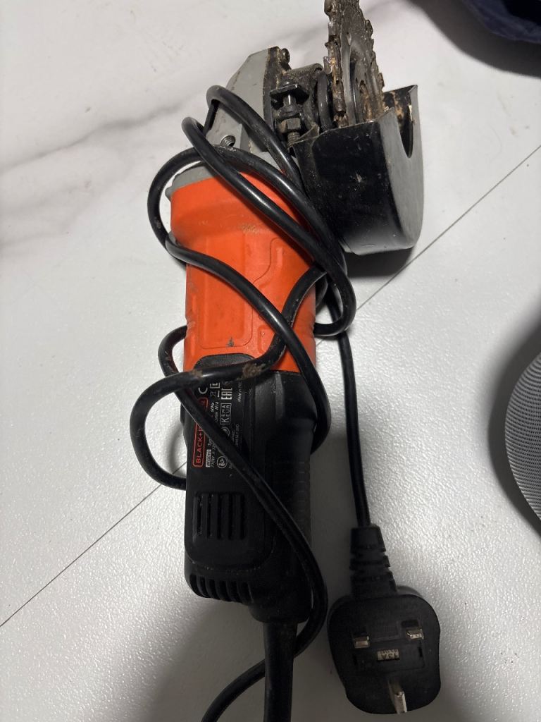 Used Electric Grinder with Saw Blade Attachment