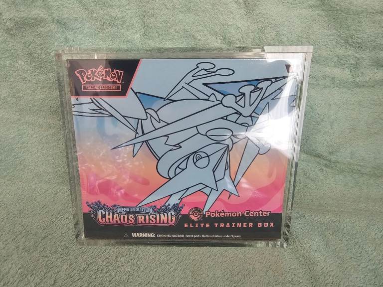 Pokémon chaos rising new/Sealed w/magnetic case