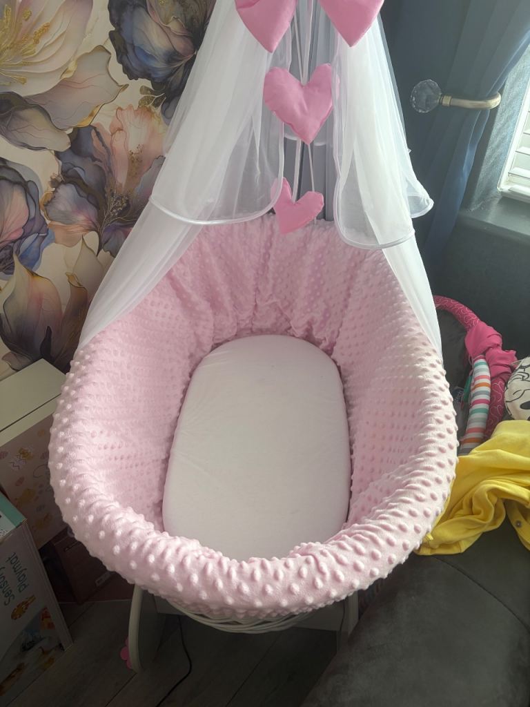 White wicker wheels Moses basket with bedding and canopy