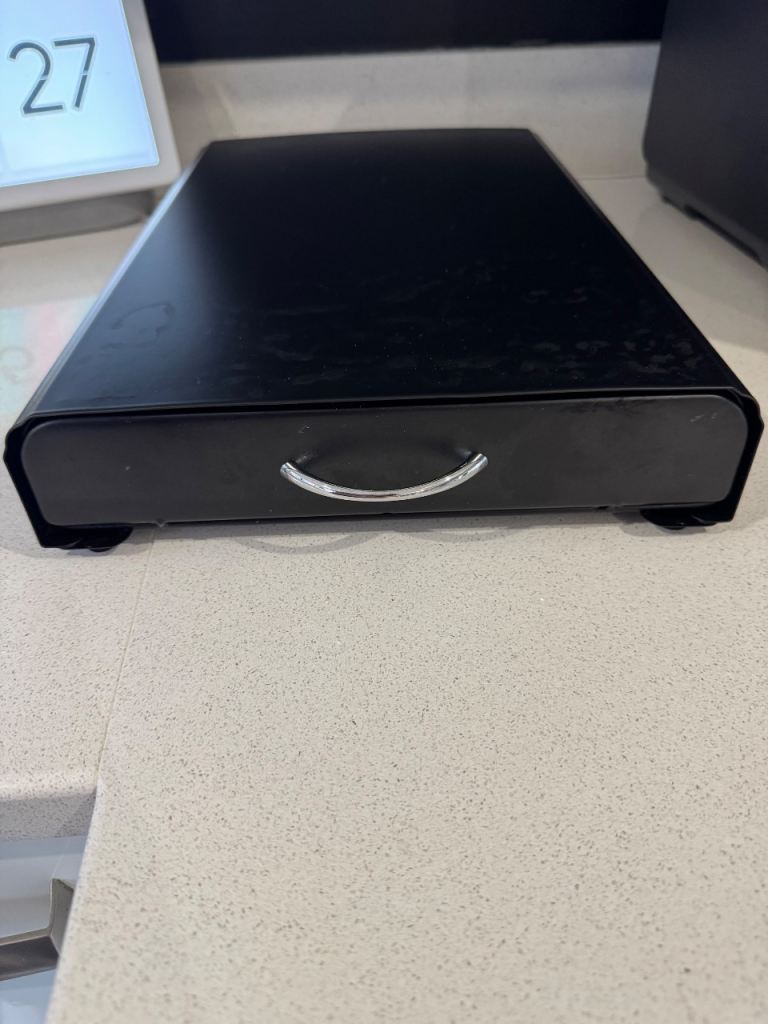 Black coffee pod drawer for under coffee machine