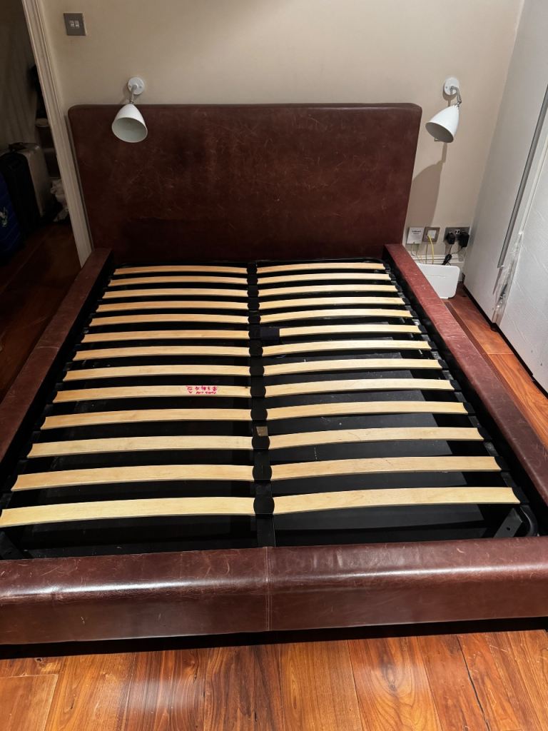 Leather bed with storage, very durable and in excellent condition 