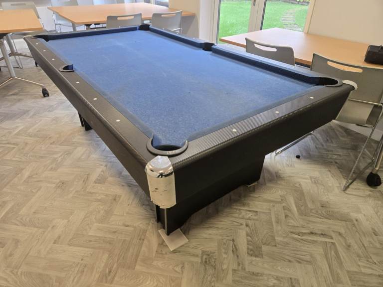 Well used wooden bed pool table 