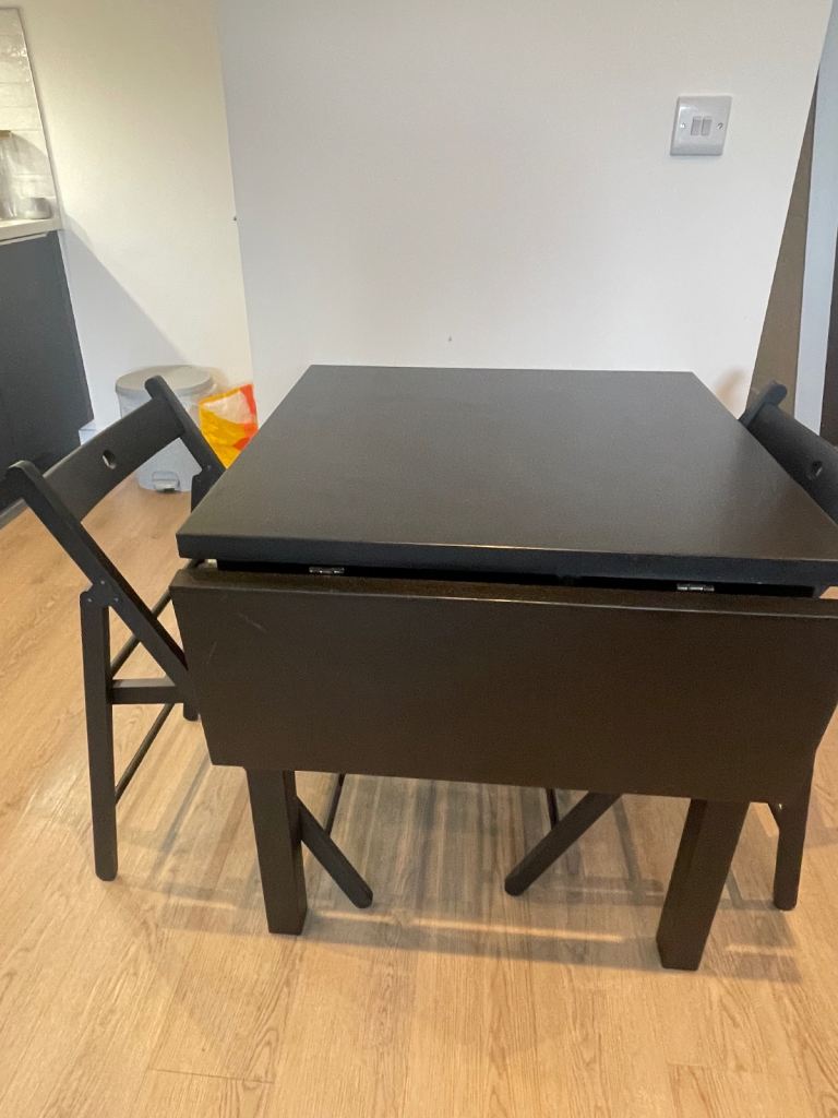 Black Drop-Leaf Dining Table with 2 Folding Chairs – Good Condition