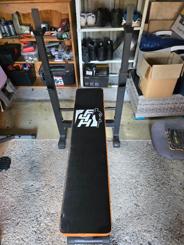 Adjustable Weight Bench with Barbell Holder – Good Condition