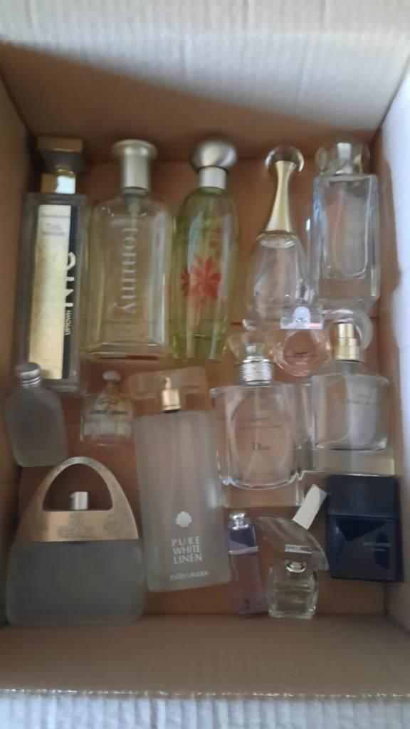 A collection  of perfume, cosmetic and liqueur bottles